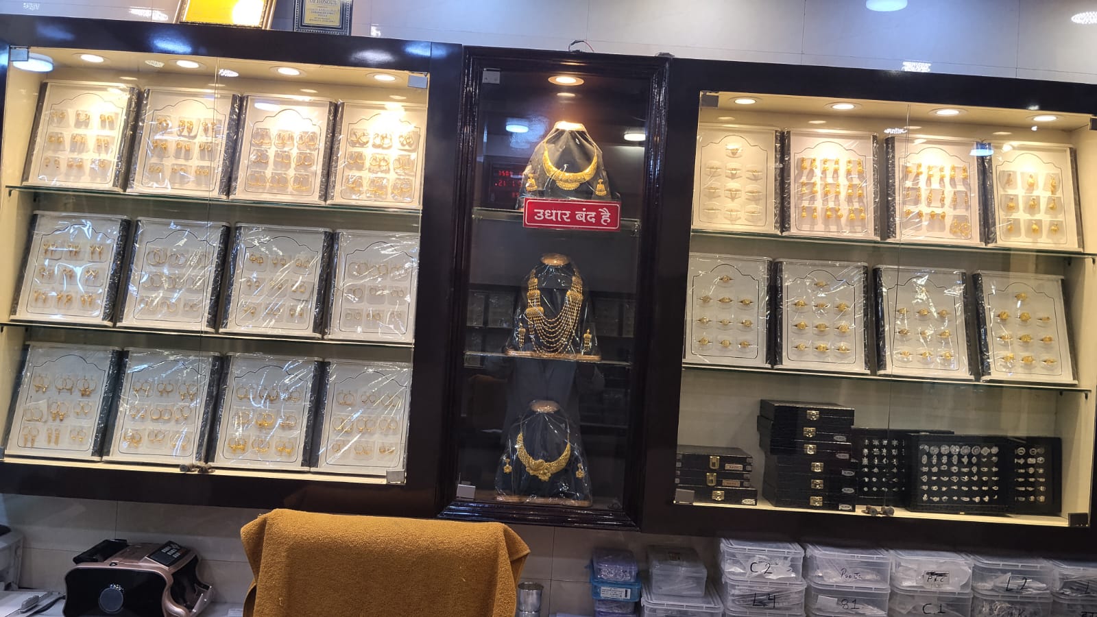 Inside the Sandeep Jewellers showroom: gold earrings, rings and bridal necklaces on display